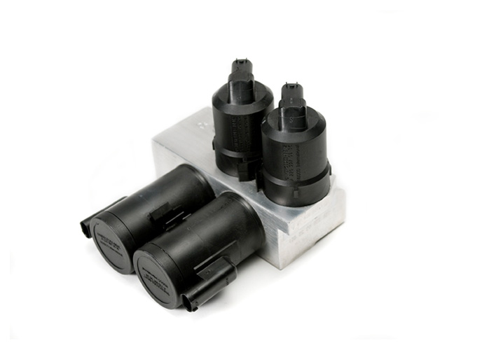 Husco suspension products include high-pressure proportional valves, zero-leak fluid pressure valves, and valves for variable damping and active roll control.